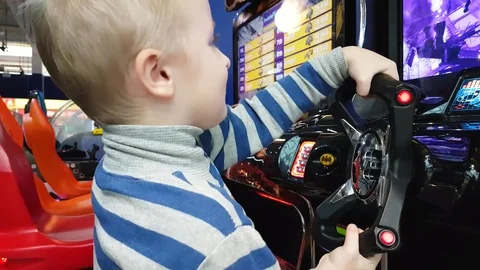 The boy on the gaming machine Stock Footage 82952436