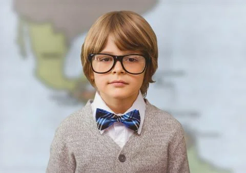 Boy genius against blurry map Stock Photos