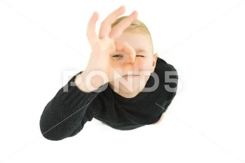 The boy gesture to the camera. View from above Stock Photos