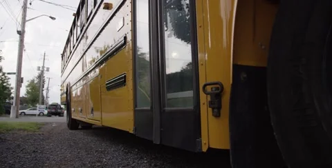 Boy Gets on School Bus Stock Footage 53402107