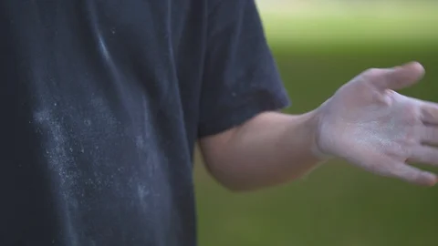 Boy Getting Chalk off of His Hands Stock Footage 91663961