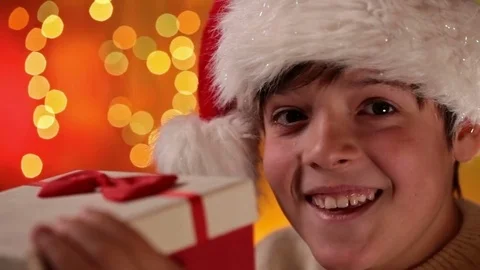 Boy getting the present he wanted for christmas Stock Footage 80185253
