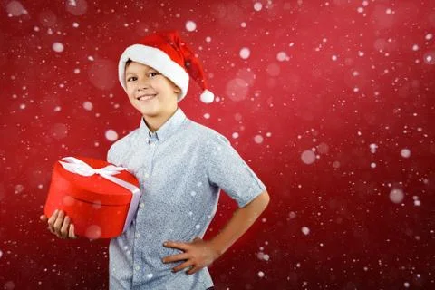 Boy with gift box Stock Photos