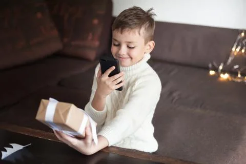 The boy with gift Stock Photos