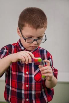 Boy with glasses as a scientist Stock-Fotos