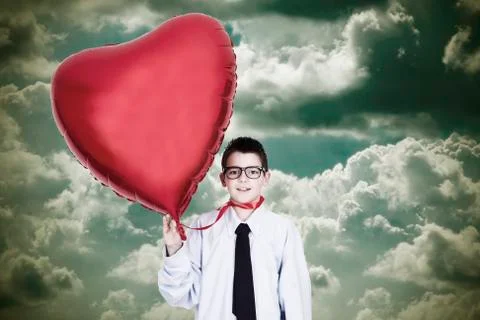 Boy with globe Stock Photos