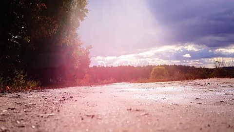 The boy goes to school. The boy is walking at sunset. Video stock 96066891