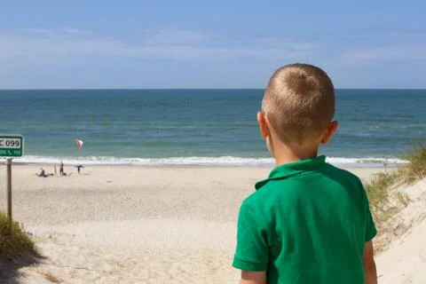 Boy going to the beach Stock Photos