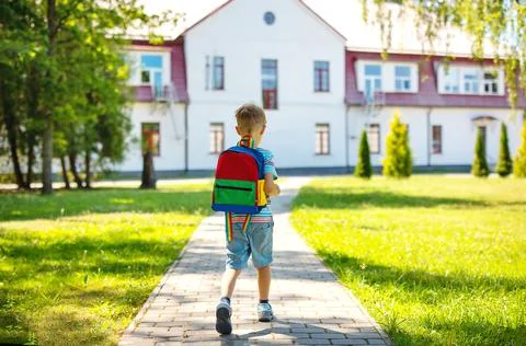 Boy going to study in primary school at first time. Stock Photos