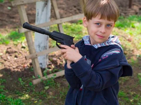 Boy with a gun Stock Photos