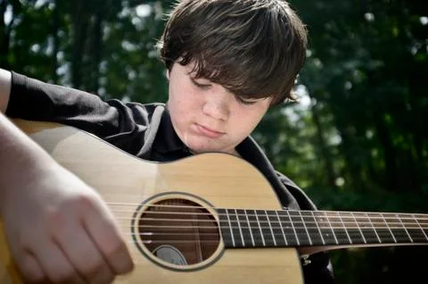 Boy with gutar Stock Photos