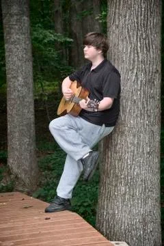 Boy with gutar Stock Photos