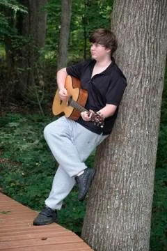 Boy with gutar Stock Photos