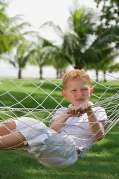 Boy in a hammock Stock Photos