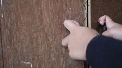 Boy hand open door knob or opening the door Stock Footage 119189302