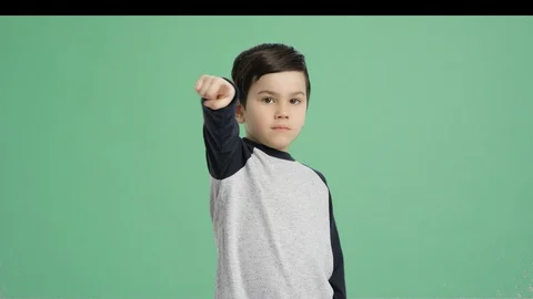 Boy hand pointing - Alpha Channel, Green Screen Stock Footage 129347342