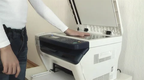 Boy hand on Xerox copies Video stock 61099457