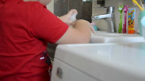 Boy handles hands Stock Footage 144490043