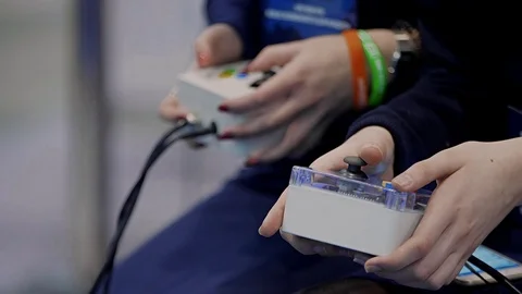 Boy hands holding remote controlling rob... | Stock Video | Pond5