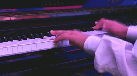Boy hands playing piano Stock Footage 53563148