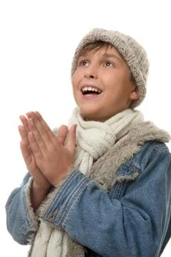 Boy hands together looking up Stock Photos