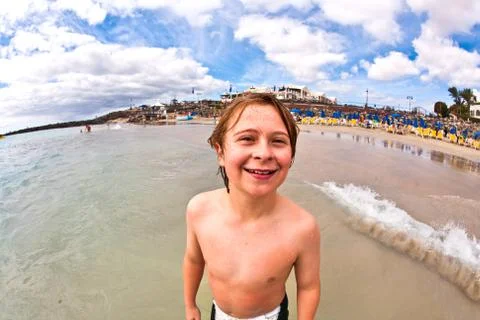 Boy has fun at the beach Foto stock