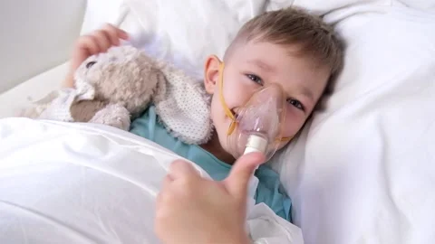 Boy has inhalation Stock Footage 145938260