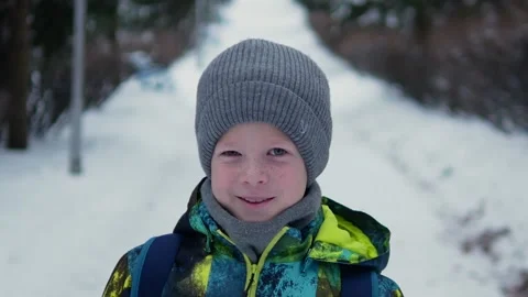 Boy hat jacket freckles winter Stock Footage 146058793