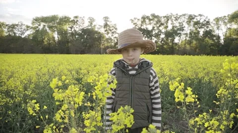 Boy in the hat looks at you Stock Footage 130242874