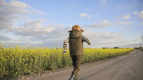 Boy in the hat is running Stock-Footage 130242995