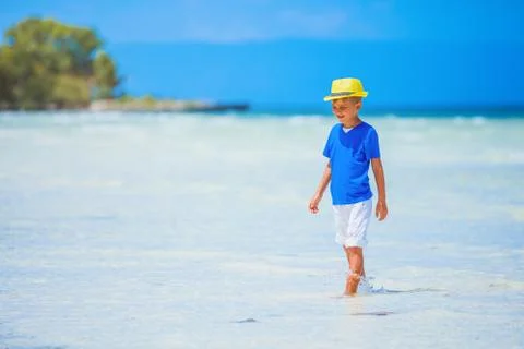 Boy in hat, sea beach 写真素材
