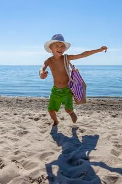 Boy in hat on summer vacation Stock Photos