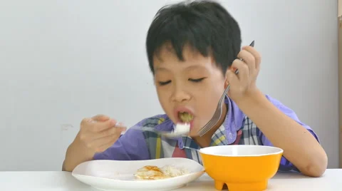 Boy having breakfast Stock Footage 55732925