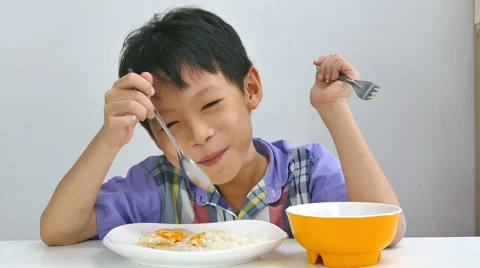 Boy having breakfast Stock Footage 55733939