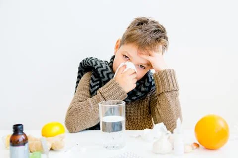 Boy having flu Stock Photos
