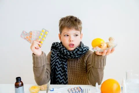 Boy having flu Stock Photos