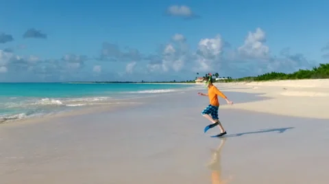 Boy having fun at beach Stock Footage 66279597