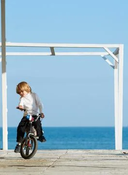 Boy having fun on bicycle Stock Photos