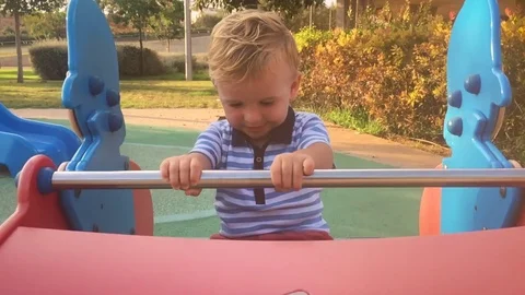 Boy having fun at the playground Stock Footage 71353026