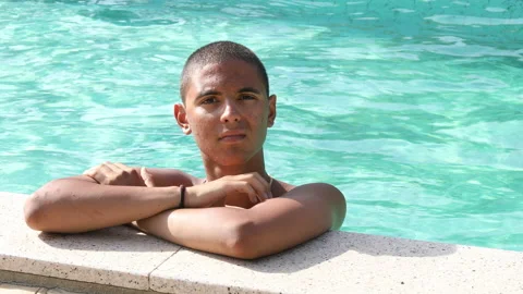Boy having fun by the pool Stock Footage 134246135