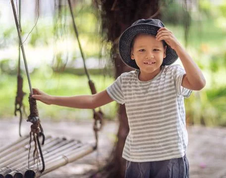 Boy having fun on the swing Boy having fun time on the swing ,model releas... Фото