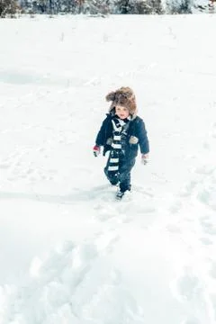 Boy having fun in winter Stock Photos