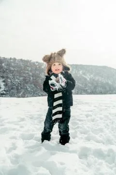 Boy having fun in winter Stock Photos