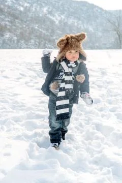 Boy having fun in winter Stock Photos