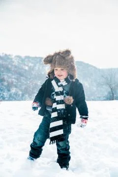 Boy having fun in winter Stock Photos