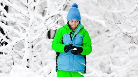Boy having fun in winter snow Stock Footage 71383377