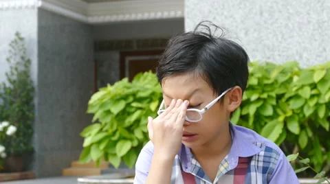 Boy having headache Stock Footage 64111310