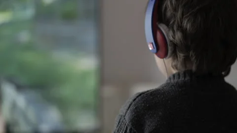 Boy in Headphones Playing Computer Multiplayer Video Game on Console. Child.. Stock-Footage 321418666