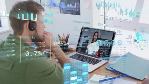 Boy with headset listening as woman on laptop showing doc, finance charts Stock Footage 333351553