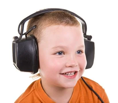 Boy in headsets Stock Photos